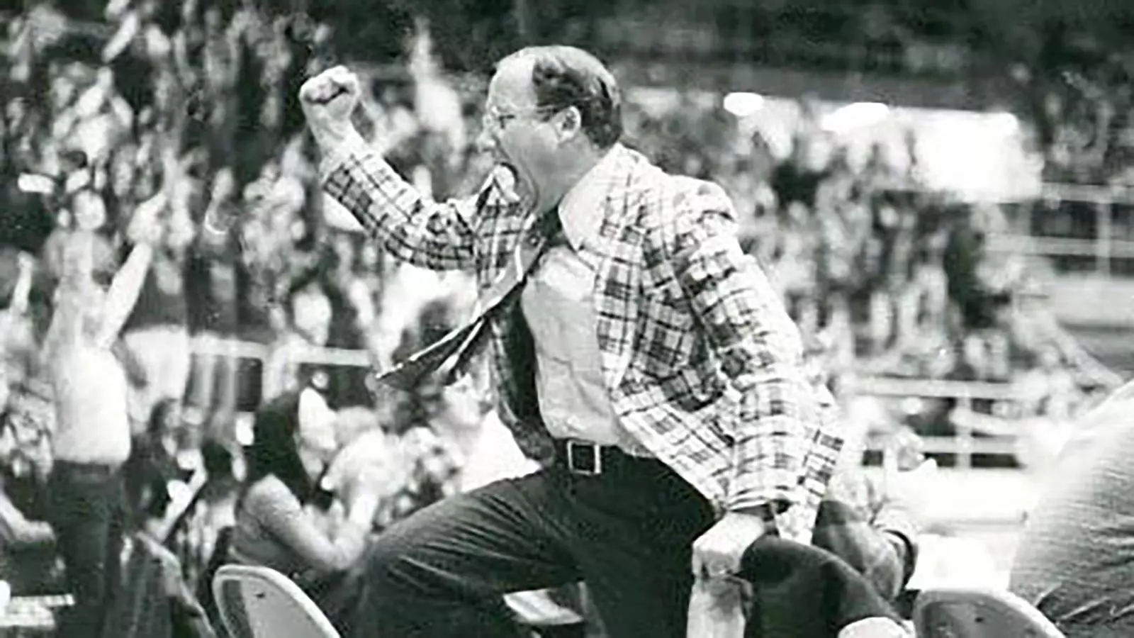 Former SID Bob Anderson celebrates